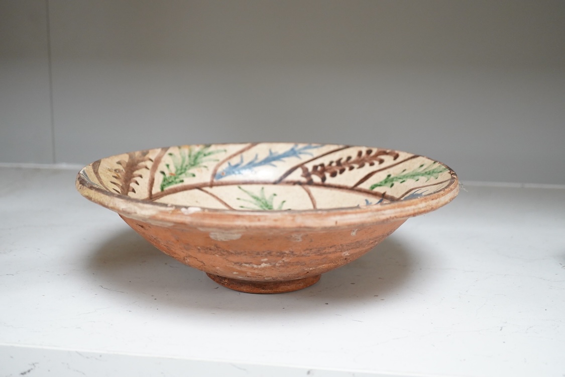 A French-Spanish border decorative pottery dish, 27cm diameter